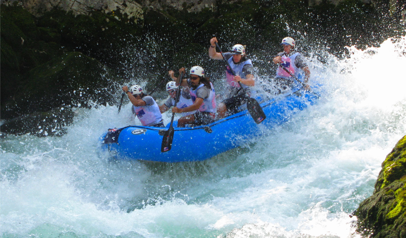 Sharkskin multisports group rafting down rapids