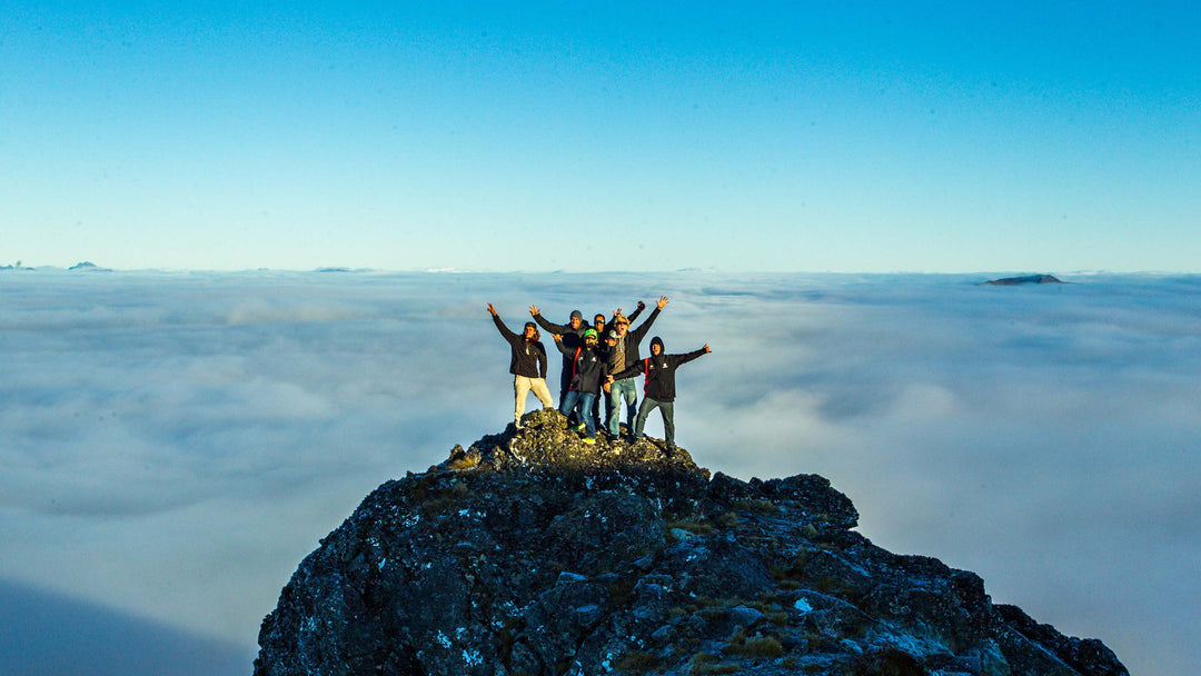 Sharkskin Jackets keeping climbers warm on a mountain top